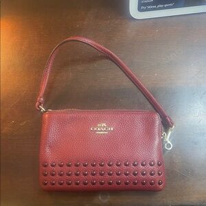 Coach Burgundy Studded Leather Wristlet
